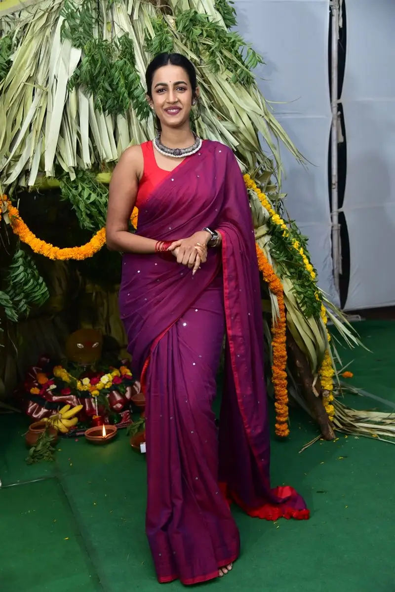 Niharika Konidela Stills in Violet Saree Sleeveless Orange Blouse